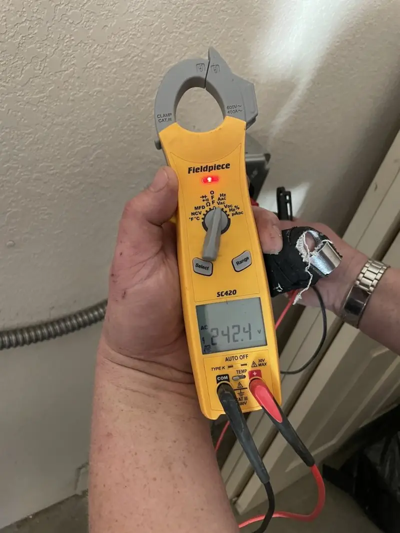 Voltage testing with clamp meter during Ceiling Fan Installation in Ivanhoe